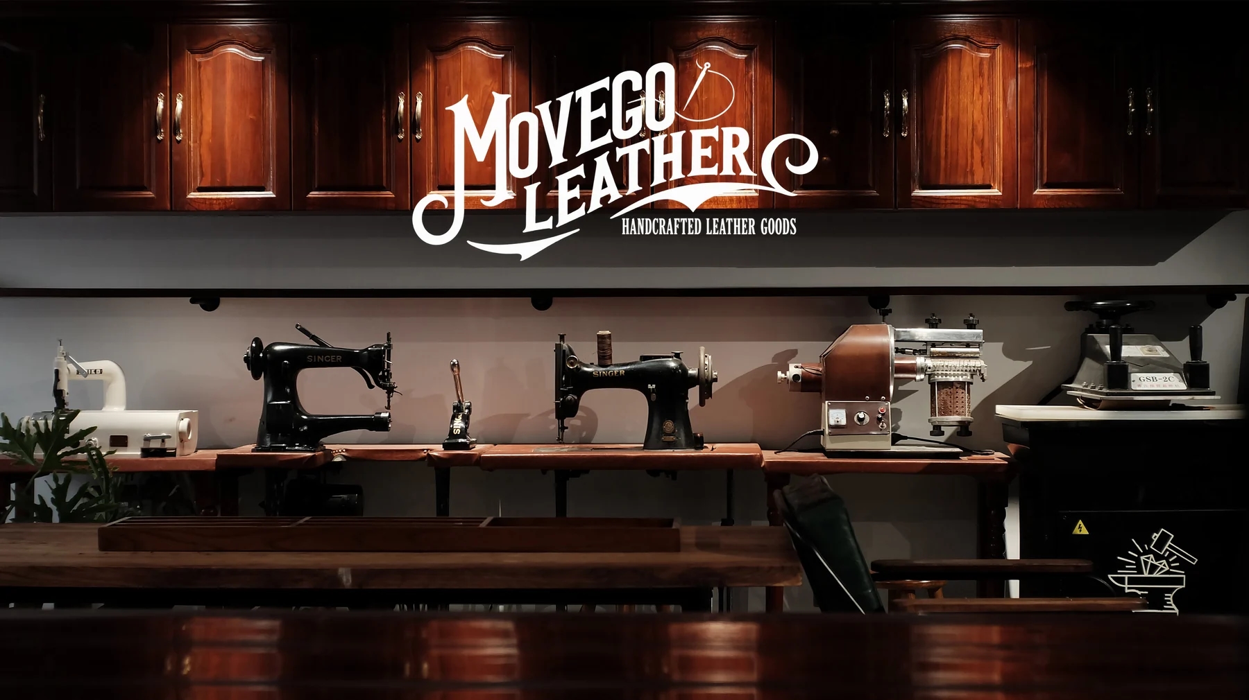 Movego Leather workshop with sewing machines and handcrafted leather goods