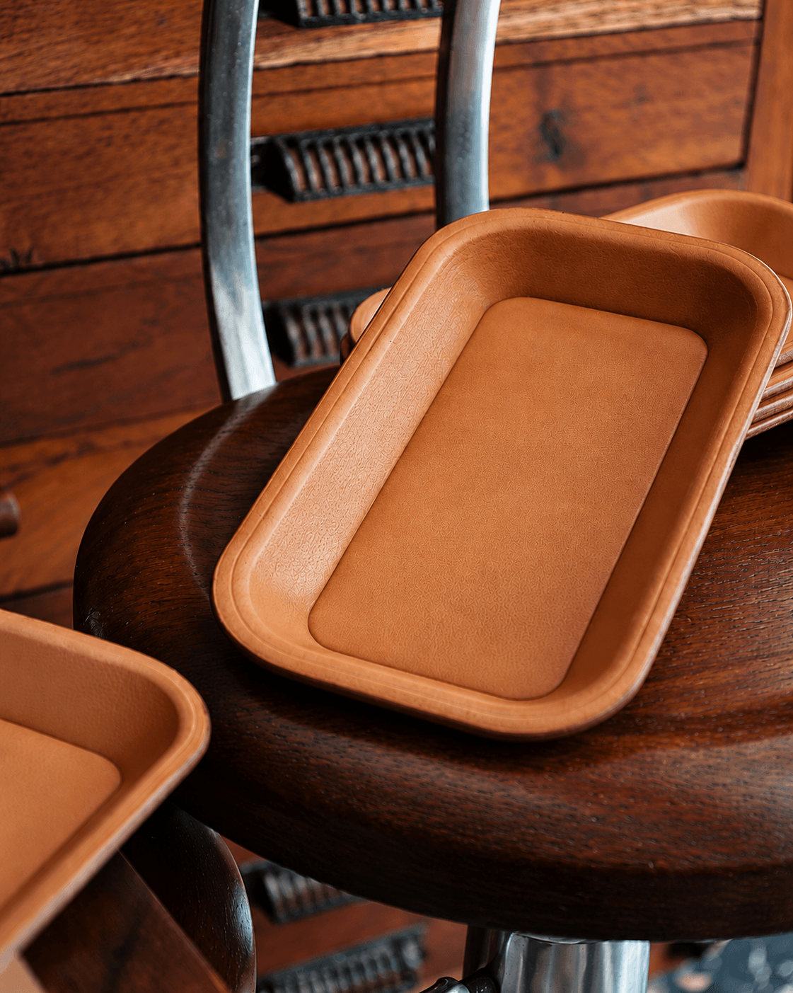 Movego leather accessories including a valet tray styled with a watch